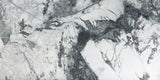 Invisible Grey Marble tile with flowing white and gold veining from Sapphirus Stone Toronto. Ideal for modern feature walls and luxury flooring.