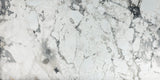 Invisible Grey Marble tile with flowing white and gold veining from Sapphirus Stone Toronto. Ideal for modern feature walls and luxury flooring.
