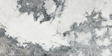 Invisible Grey Marble tile with flowing white and gold veining from Sapphirus Stone Toronto. Ideal for modern feature walls and luxury flooring.